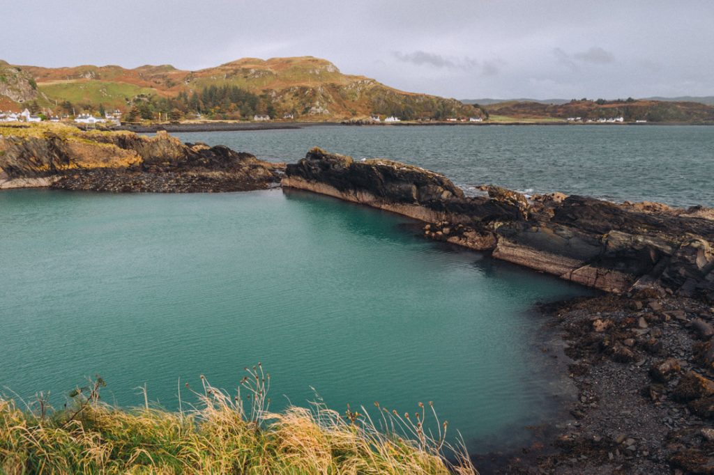 Bright blue flooded quarry on Easdale Island