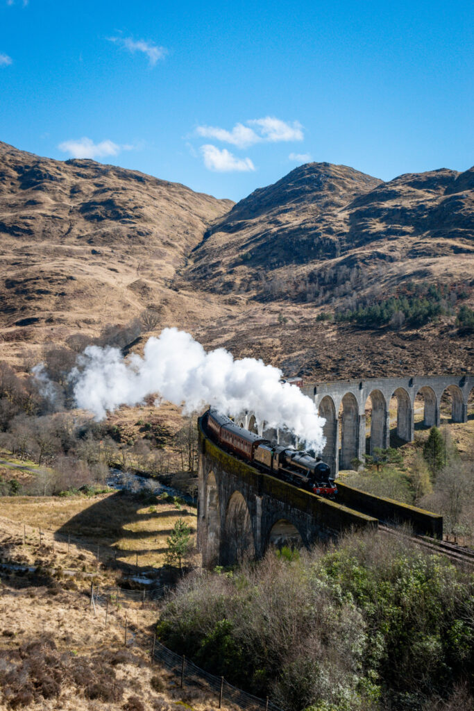 Jacobite Steam Train crossing the Glenfinnan Viaduct